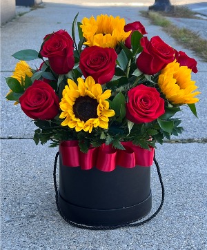 Sunflowers and Red Roses  Sunflowers and roses in a Black box 