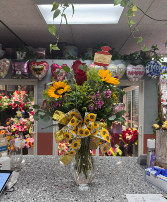 Sunflowers and Rose in vase 