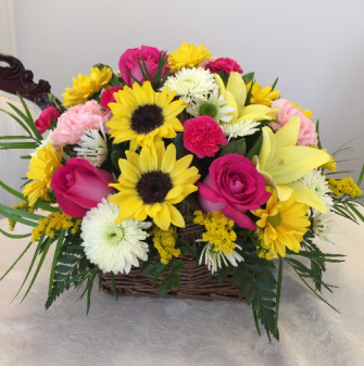 SUNFLOWERS, LILLIES, AND ROSES BASKET ARRANGEMENT