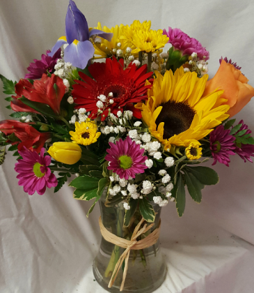Have A Sunny Day Bouquet! Seasonal flowers arranged in a clear vase!