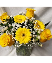 SUNNY DELIGHT...YELLOW ROSES AND YELLOW Gerbera daisies or sunflowers if gerberas out of stock with seasonal filler