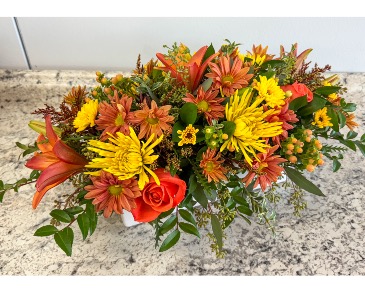 Sunset Harvest Blooms Centerpiece in Saint Simons Island, GA | A COURTYARD FLORIST