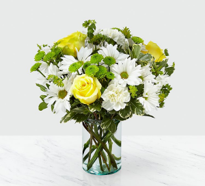 Sunshine and daisies  Fresh arrangement in a vase 