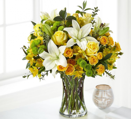 Sunshine  Fresh arrangement in a vase 