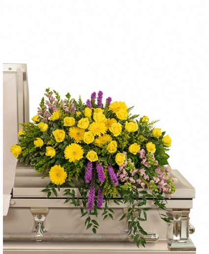 Sunshine from Heaven Casket Spray Funeral Arrangement