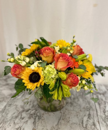 Sunshine Smiles Orange, Yellow, Greens   Compact vase in Winter Park, FL | APPLEBLOSSOM FLORIST & GIFTS