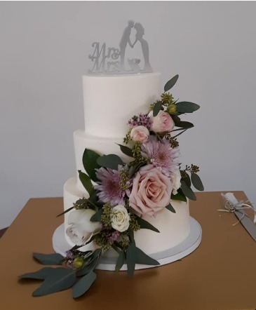 swag wedding cake wedding cake in Cleveland, GA | Artistic Florist