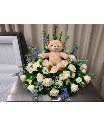 SWEET INNOCENCE CASKET SPRAY Funeral Flowers in Galveston, TX | MAINLAND FLORAL