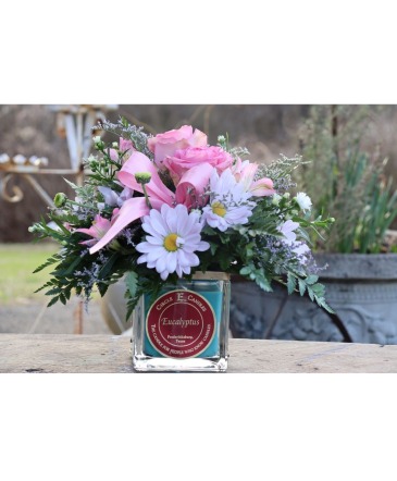 Sweet Surprise  22 oz. Circle E Candle with flowers in Monticello, GA | CRAZY DAISY'S FLORAL