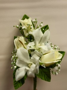 Sweetheart rose and dendrobium orchid corsage