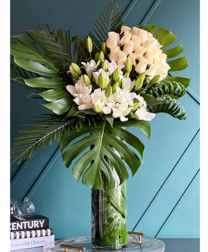 Tall arrangement with roses and lilies  
