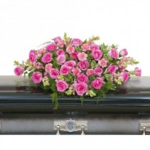 TEARS OF SORROW Half Casket Spray of pink roses and carnations, pink snapdragons and more. 
