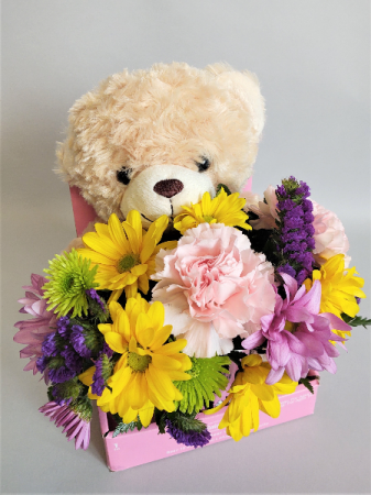 Valentine flowers with store teddy bear