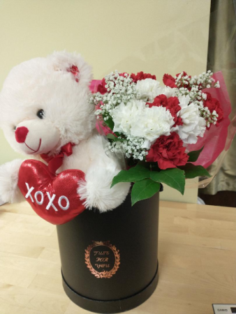 Teddy ,chocolates, and 12 carnations in a just for you hatbox