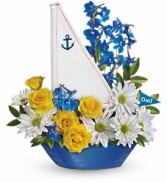 Teleflora's Captain Carefree Sail Boat Arrangement This item is for local delivery ONLY