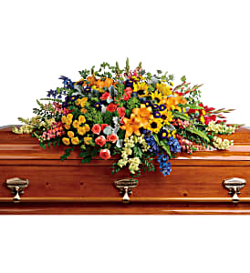 Teleflora's Colorful Reflections Casket Spray Sympathy in Auburndale, FL | The House of Flowers