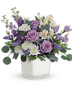 Teleflora's Honey Lavender Blooms Fresh Arrangement in a Teleflora Container