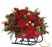Teleflora's Vintage Sleigh Christmas arrangement