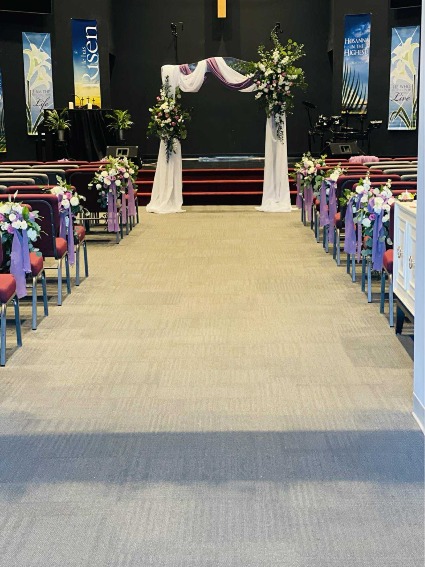 The Flowered Embrace Arch and Pew decor