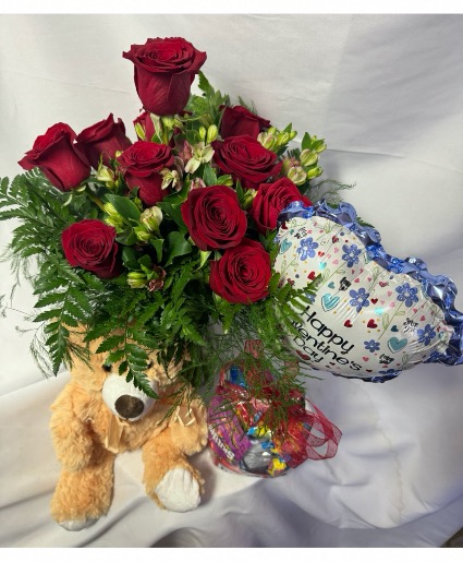 THE BIG DEAL DOZEN ROSES, TEDDY BEAR, AND SNACK PACK FINISHED WITH A BALLOON