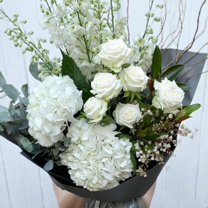 The Classic All White Wrapped Bouquets