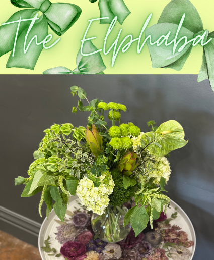 The Elphaba All green arrangement featuring anthuriums, amaranths, bells of ireland, dianthus, kale, hydrangeas, and hypericum berries 