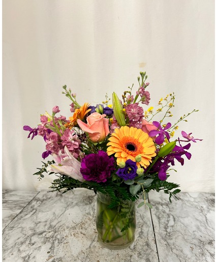The Julie Vase Hurricane filled with beautiful flowers
