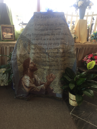 THE LOR'DS PRAYER AFGHAN ON EASEL