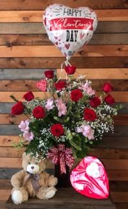The Works premium Dozen Roses, mylar balloon, chocolates and plush bear