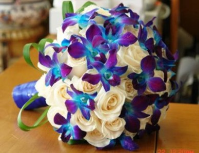 This Bouquet with blue orchids and white roses pricing determine the size of bouquet