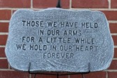 Those we have held in our arms stone