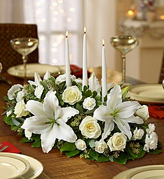 Traditional All White Holiday Centerpiece With Taper Candles in Gainesville, FL | PRANGE'S FLORIST Traditional All White Holiday Centerpiece With Taper Candles in Gainesville, FL | PRANGE'S FLORIST