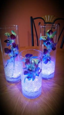 floating purple orchid centerpieces
