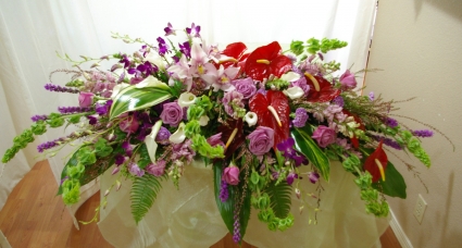tropical sunrise casket spray