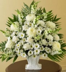 WHITE WONDER TRIBUTE All white flowers in a floral arrangement