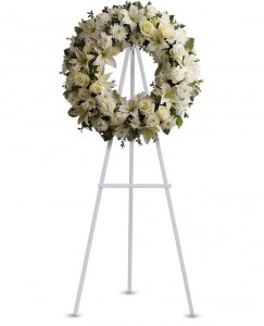 All  white sympathy  wreath. May or may not  need 1 day's notice. 