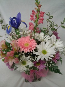 Soft colors of pinks, lavenders, whites and blues arranged in a vase!
