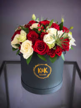 V-31 RED AND WHITE ROSES IN A BLACK HAT BOX
