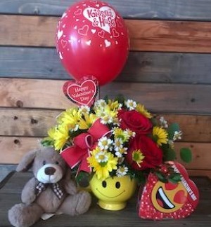 Valentine Smiles Daisies in a smile mug with 3 roses, sm box chocolate, 5" plush puppy, latex valentine balloon