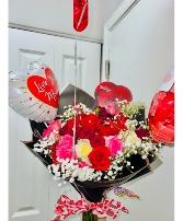 Valentines design with chocolate and Balloon Roses bouquet