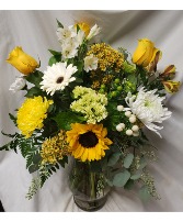 Vase arrangement of yellows, greens and whites (Flowers could be different depending on stock but will stick to those colors)