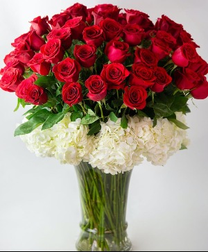 very large arrangement of red roses 