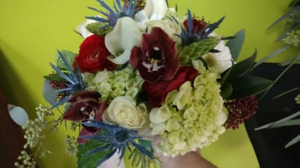 Very Unique , But Stunning !!!! A Bouquet done with Star Of Bethlehem , Blue Thistle , Green Hydrangeas , Deep Red Cymbid Orchids  , White Cala Lily 