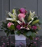 Very Victorian Roses and Lilies in a ceramic Container 