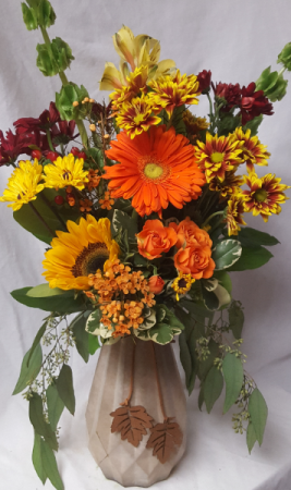 Elegant Autumn vase with dangling leather leaves Arranged with bright seasonal flowers...(vase color may differ...but all fall related)great keepsake vase
