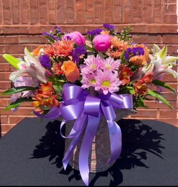 Vibrant blooming basket   in Mcdonough, GA | Parade of Flowers