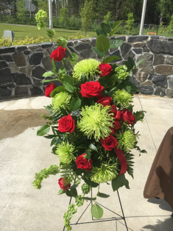 Vibrant Green with Red Roses Standing Spray in Red Lake, ON | FOREVER GREEN GIFT BOUTIQUE