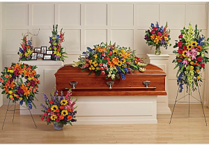 Vibrant Memories Funeral Setting Casket Spray + Accent Pieces in Henderson, TX | RAYFORD FLORIST & GIFTS Vibrant Memories Funeral Setting Casket Spray + Accent Pieces in Henderson, TX | RAYFORD FLORIST & GIFTS