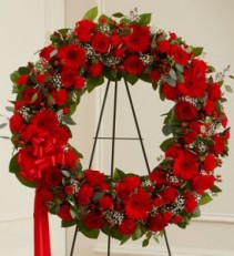 VIBRANT RED WREATH  Funeral flowers