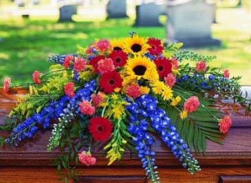 Vibrant Rememberance Casket Spray in Converse, TX | KAREN'S HOUSE OF FLOWERS & CUSTOM CREATIONS